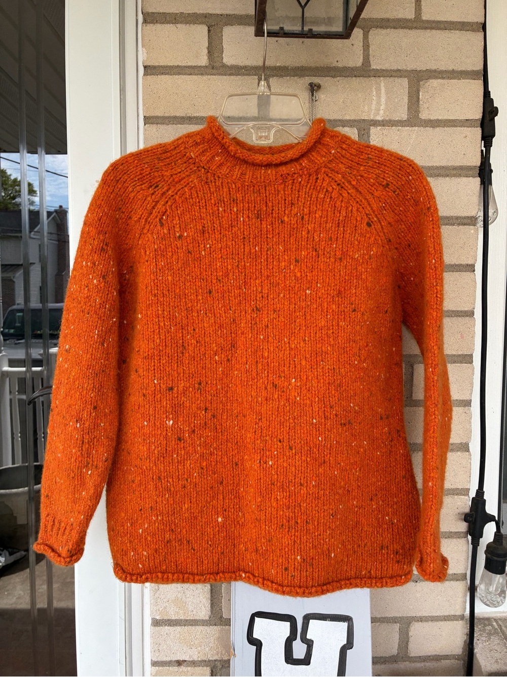 100% pure new wool orange mock neck sweater